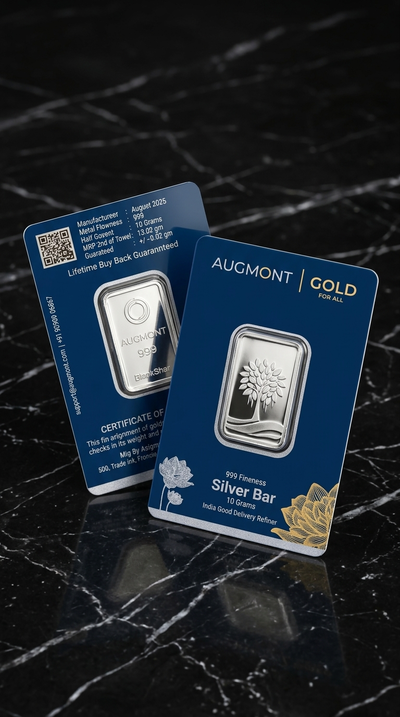 Two Augmont Gold and Silver bars in blue and blue packaging, displayed on a black marble surface.